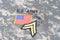 US ARMY Corporal rank patch, sniper tab, flag patch, with dog tag on camouflage uniform