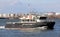 US Army Corps of Engineers Survey Vessel MORITZ passing Kill Van Kull strait westward on background of Bayonne, NJ