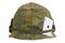 US Army helmet Vietnam war period with camouflage cover and ammo belt and amulet ace of clubs playing card