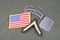 US ARMY Private rank patch, special forces tab, flag patch and dog tag on olive green uniform