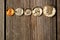 US cent coins over wooden background