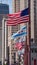 US and Chicago Flags on DuSable Bridge in Chicago - CHICAGO, USA - JUNE 11, 2019