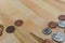 US Currency Cents on a Wooden Table