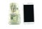 US dollars in a small glass jar and a smart phone, concept of investing or spending money by a smart application on phone