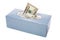 Us dollars in a tissue box