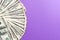 US Dollars: Untidy fan of various US dollar bills Top view of business concept on colored background