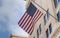 US flag displayed from Los Angeles downtown city building.