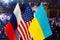 The US flag, Russian flag, Ukraine flag. Flag of USA, flag of Russia, flag of Ukraine. The United States of America and the Russia