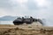 US Marine Corps Landing Craft Air Cushion or LCAC lands on the beach