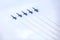 US Navy Blue Angels Hornet Fighter Jets Flying In Formation With Smoke Trails During An Air Show Performance