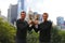 US Open 2014 men doubles champions Bob and Mike Bryan posing with trophy in Central Park