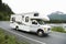 USA, Alaska, Recreational Vehicle Driving On Road