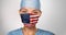 USA American doctor wearing Coronavirus pandemic COVID-19 mask in the United States of America. American flag print on