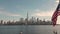 USA American flag. Memorial Day, Veteran's Day, July 4th. American Flag Waving near New York City, Manhattan view