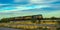 USA, ARIZONA - NOVEMBER 24, 2019: freight train of several electric locomotives in the Arizona desert