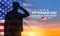 USA army soldier saluting on a background of sunset. Veterans Day, Memorial Day, Independence Day background