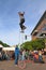 USA, AZ/Tempe - Unicyclist Jamey Mossengren (2) - Reaching the Top Of 12-ft Cycle