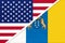 USA and Canary Islands national flag from textile. Relationship between american and european countries