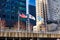 USA, Chicago and Illinois Flags Flying Beside River