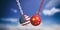 USA and Chinese flags wrecking balls swinging on blue cloudy sky background. 3d illustration