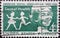 USA - Circa 1959 : a postage stamp printed in the US showing a laughing girl and the silhouette of two children. Text: American De