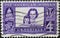 USA - Circa 1960 : a postage stamp printed in the US showing a mother and daughter before a book, surrounded by symbols of areas w