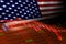 USA Flag and Economic Downturn With Stock Exchange Market Indicators in Red