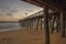 USA Flag Flying in the Predawn on a Fishing Pier