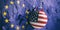 USA flag wrecking ball breaking a European Union flag wall. 3d illustration
