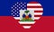 USA and Haiti flag on fabric texture. The concept of cooperation between the two countries