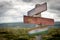 Usa, India and China national flags on wooden signpost outdoors in nature.