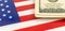 USA money laundering, banner. Dollar bills over the American flag. Criminal and outlaw concept background photo