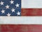 USA national colors painted on faded wooden boards