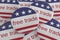 USA News Badges: Pile of Free Trade Buttons With US Flag 3d illustration