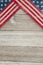 USA patriotic old flag on a weathered wood background