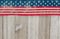 USA patriotic old flag on a weathered wood background