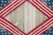 USA patriotic old flag on a weathered wood background