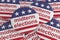 USA Politics Badges: Pile of Midterm Elections Buttons With US Flag, 3D Illustration