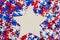 USA red, white and blue stars with wood star background