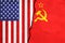 USA and Soviet Union painted flags on a wall with a crack. United States of America and Soviet Union relations