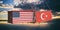 USA and Turkey trade war. US of America and Turkish flags crashed containers on sky at sunset background. 3d illustration