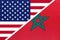 USA vs Morocco national flag from textile. Relationship between two american and african countries