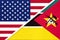 USA vs Mozambique national flag from textile. Relationship between two american and african countries