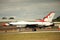 USAF Thunderbirds flying aerobatic team on a military airfield