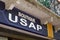 Usap USA Perpignan logo and text sign front of store French sports club