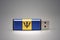 Usb flash drive with the national flag of barbados on gray background.