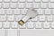 USB key, memory stick on white keyboard