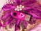 USB pink flash drive with hearts on beautiful figure closeup