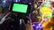 Use hands Game Pad with smartphone on black table with colorful lights, Christmas New Year Composition. Smartphone gaming video