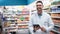 We use the latest tech at our pharmacy. Portrait of a handsome mature pharmacist using a digital tablet in a pharmacy.